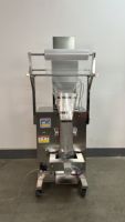 Équipement d'emballage automatique vertical en acier inoxydable pour l'emballage de noix, granulés, liquides et huiles comestibles en sachets