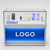 Vitrine en verre sur mesure, comptoir d'exposition pour téléphones avec base éclairée pour l'aménagement de magasins de téléphonie mobile