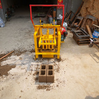 Fabricant de machines à fabriquer des blocs de briques creuses manuelles mobiles en béton et en ciment, prix le plus bas