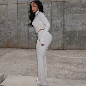 Trajes de Club sexy informales para mujer New Street Wear Conjunto de dos piezas Patrón sólido Top de longitud corta y pantalones a juego - Product Image 3