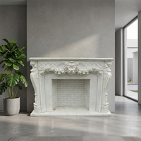 Cheminée en marbre blanc de style rococo français, sculptée à la main avec des motifs de roses, pour la décoration de villas et de maisons.