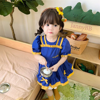 Robe pour enfants en pur coton, broderie tournesol artisanale, manches courtes, pour séances extérieures, vente en gros