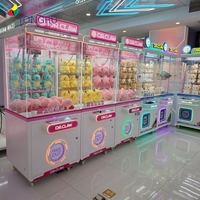 Machine à griffes rose avec éclairage magnifique, machine à griffes Clawee avec jeu de griffes, arcade, machine à griffes d'arcade, jeu de machine à griffes
