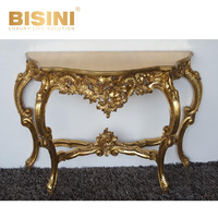 Table console baroque en or antique, cadre en PU sculpté à la main avec finition en feuille d'or et plateau en bois, table élégante pour maisons de luxe