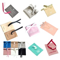 Pochette à bijoux en velours suédé gris avec ruban et logo en feuille d'argent, faible MOQ, vente chaude 2026