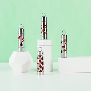 Flacon de parfum en acier inoxydable et pendentif pour huile essentielle à porter sur un collier |   Conception creuse avec insert en éponge colorée - Product Image 2