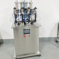 Nouvelle Conception Haute Qualité Traitement Fabrication Parfum Machine de Remplissage de Parfum à 4 Têtes Machine de Remplissage Sous Vide à 4 Buses pour Liquide