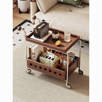 Table basse mobile à déplacement latéral en bois massif de begonnie avec plateau, panier de rangement, cadre en acier inoxydable poli et chariot à boissons sur roulettes