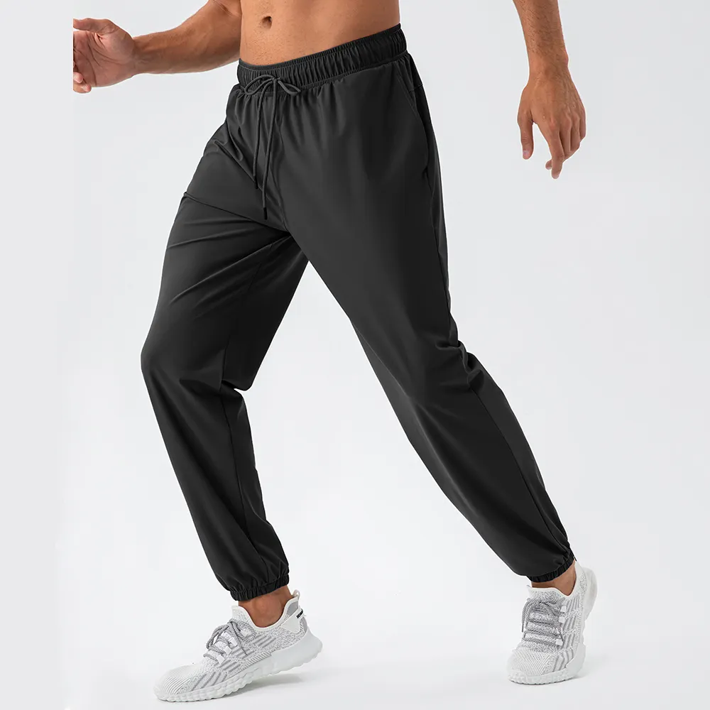 Pantalons de sport Logo personnalisé Vêtements de sport respirants en coton Pantalons de survêtement Entraînement Running Men Running Jogging Pants