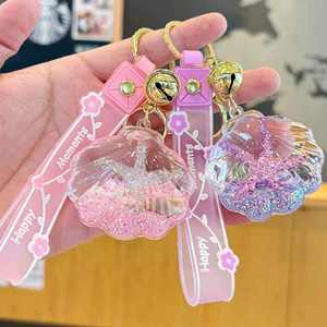 Exquisito Llavero Acrílico con Forma de Concha, Colgante para Bolso, Botella de Arena Movediza Impregnada de Aceite, Diseño de Dibujos Animados de Moda, Tipografía - Product Image 1