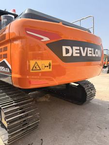รถขุด Doosan DX225 มือสอง 22 ตัน ห้องโดยสารสีส้ม พร้อมไฟเตือนสีแดงและพลาสติกหุ้ม - Product Image 5