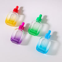Vente en gros de flacons en verre ronds bleus dégradés de 50 ml - Contenant vide pour huile essentielle avec logo personnalisé et compte-gouttes en caoutchouc