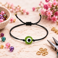 Bracelet en cordon de nylon noir réglable Go2boho avec breloque en résine œil vert, extrémités plaquées or, bijou tendance pour cadeau