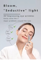 Soins des yeux anti-âge Massage chaud Élimine les cernes Masseur électrique pour les yeux Massage des yeux anti-rides rouge et bleu