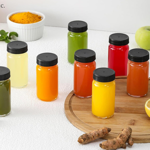 Venta al por mayor de botellas de muestra de 2oz 60ml transparentes tipo Ginger Jar, envases vacíos de vidrio para shots de jengibre con tapa de rosca negra - Product Image 2