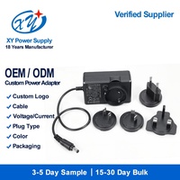 Adaptateur de voyage universel AC/DC avec prises interchangeables US, EU, UK, AU, alimentation à découpage 12V 24V 36W, OEM personnalisé