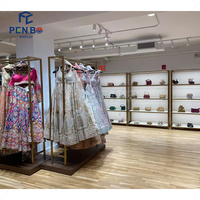 Luminaire de magasin personnalisé Boutique meubles magasin de détail vêtements pour femmes étagère à vêtements présentoir à vêtements en or