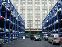 Système de stationnement de voiture à levage automatique à tour de peigne de traction rapide à plusieurs niveaux
