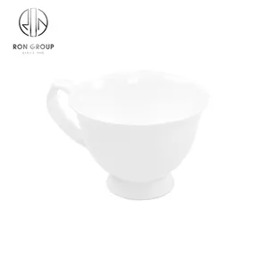 Tasse à café et soucoupe en porcelaine de style élégant avec support de pied peut conception OEM service à thé en céramique