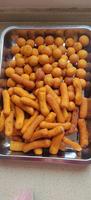 Machine de friture continue entièrement automatique pour la production de frites, chips, poulet, poisson, boulettes de viande, cacahuètes et pommes de terre frites