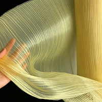 Tissu d'organza plissé texturé semi-transparent à rayures verticales nacrées, tissu scintillant pour robe de femme