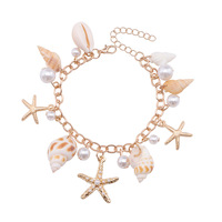 Ensemble collier et bracelet pour femme en alliage de perles dorées, motif étoile de mer et coquillage, style bohème, idéal pour les vacances à la plage, vente en gros