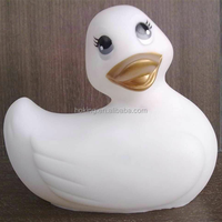 Vente chaude, canard en caoutchouc personnalisé, massage, canard vibrant blanc, canard de bain pour enfants