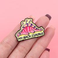 Spilla in metallo all'ingrosso con dinosauro cartone animato, spilla creativa con citazione e lettere inglesi, distintivo souvenir per abbigliamento e accessori