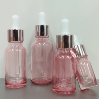Bouteilles d'huiles essentielles personnalisables de haute qualité 5ml-100ml, flacon compte-gouttes en verre rose à col, prix bas, fabricant professionnel