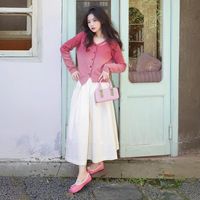 Haut tricoté à manches longues rose dégradé de style nouveau-Design féminin, niche, haut tricoté asymétrique à manches courtes