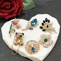 Broches XUPING en gros pour cadeaux de mariage, accessoires de mode papillon, fleur, perle, grande épingle, broches animales pour femmes