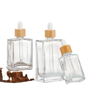 30ml 50ml 100ml Rectangle Clear Glass Serum <b>Dropper</b> <b>Bottles</b> Skin Care Essential Oil Gold Sliver Bamboo Cap Screen Printed Custom - Product Image 4