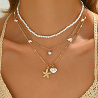 Collier pendentif YEHHY en fausses perles, pampilles, pierres concassées, étoiles de mer et coquillages, perles, multicouche, pour femme, idéal pour l'été et la plage
