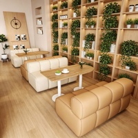Ensemble table et banquette de restaurant au design moderne style crème, avec coussins de canapé en cuir pour café et bistrot