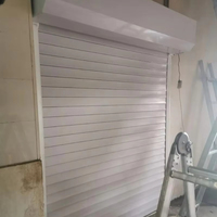 Portes à enroulement en acier 98 avec lames en mousse PU, isolation thermique, adaptées à l'usine et à la maison