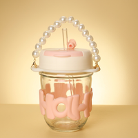 Tasse en verre de thé de lait de café de logo personnalisé mignon avec les pailles roses pour boire le jus ou boire le thé