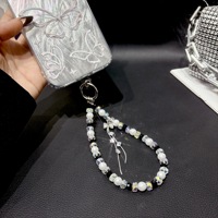 Nouvelle chaîne de téléphone portable perlée avec nœud, porte-clés, pendentif de sac, chaîne décorative pour étui d'écouteurs pour femmes