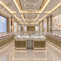 Aménagement intérieur de magasin de bijoux sur mesure, comptoir de présentation en verre avec cadre doré pour boutique de bijoux de luxe