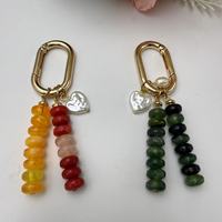Porte-clés bohème en acrylique en forme de disque avec perles, breloque de sac avec mousqueton doré, pendentif cœur en perle, accessoire de sac à pompon pour femme
