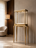 Vitrine à bijoux sur pied sur mesure avec cadre en acier inoxydable finition or, vitrine en verre et éclairage LED