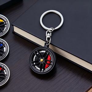 พวงกุญแจโลหะหมุนได้แบบขายส่ง สำหรับโปรโมชั่น ตกแต่งด้วยล้อดูดซับแรงกระแทก รูปทรงเทอร์โบรถยนต์ เหมาะสำหรับเป็นของขวัญ - Product Image 2