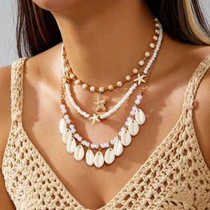 Collier Evan multicouche bohème avec coquillages et étoiles de mer - Colliers superposés romantiques pour femmes, perles d'imitation, pour les vacances d'été à la plage - Product Image 6