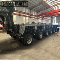 Remorque modulaire hydraulique de type Goldhofer, multi-essieux, plateau surbaissé pour le transport d'équipements lourds