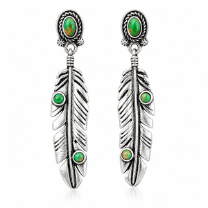 Orecchini lunghi vintage con piume turchesi, regalo per feste da donna - Product Image 1