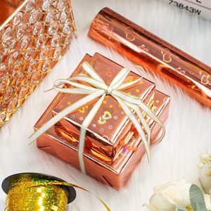 Papel de regalo romántico de alta gama para San Valentín con diseño de corazón láser en oro rosa y líneas de corte traseras personalizables - Product Image 1