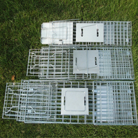Vente en gros de cage pour animaux vivants en fil de fer métallique piège à renard cage pour chien revêtement en poudre verte piège à chat à double porte