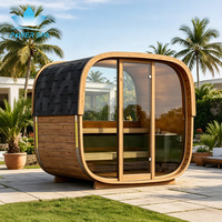 Traditioneller Garten-Saunaraum aus Kanadischer Rotzeder mit Wasserdichter Schwarzer Schindel und Massivholzkonstruktion