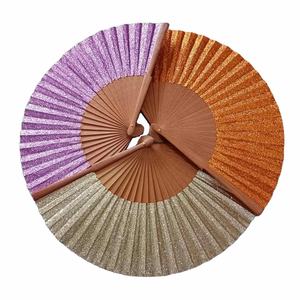 Ventilador de mano plegable decorativo Bling Festival 23cm personalizado hierro madera y bambú portátil tallado Rave ventilador para regalos de negocios - Product Image 1