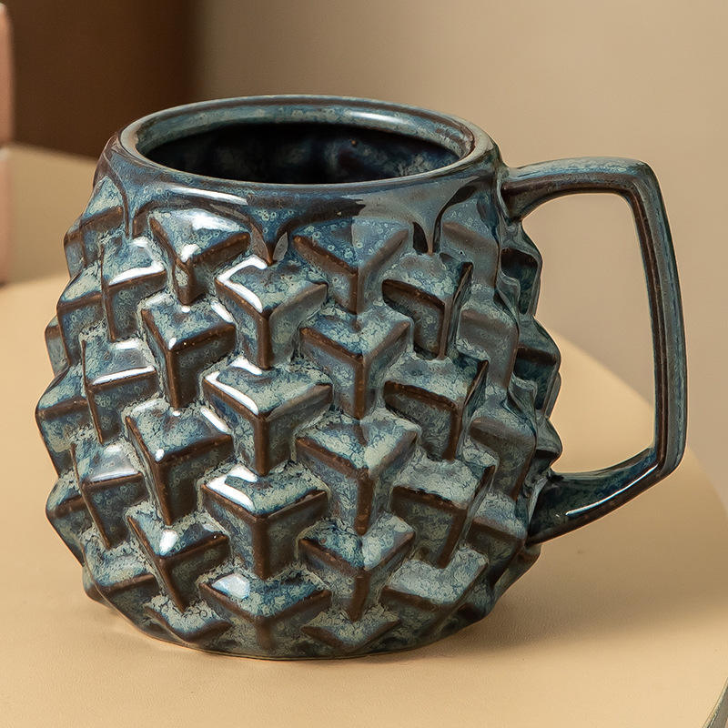 ถ้วยทรงข้าวหลามตัดลายภูเขาและทะเลดินเหนียวสีเขียว