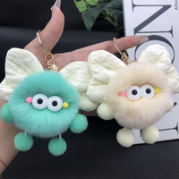Accessoires de porte-clés : Breloque en fausse fourrure pelucheuse, nœud rembourré doux, boule de charbon écologique, porte-clés promotionnel personnalisable